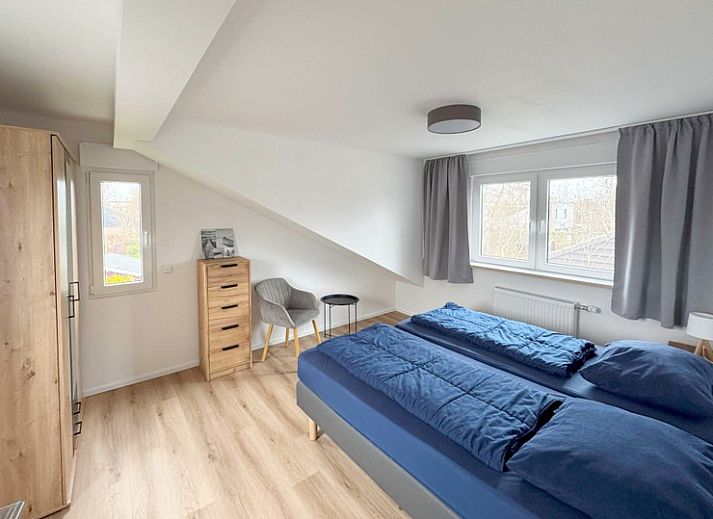 Vacation home A 301 in De Cocksdorp, Texel, offers a modern exterior with quiet surroundings on the Wadden Islands.