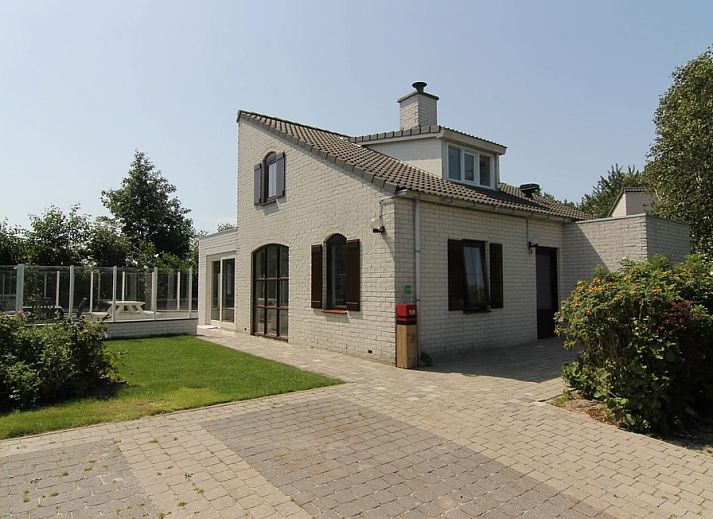 Vakantiehuis G 769 in De Cocksdorp, Texel, met zonnig terras en groene tuin, ideaal voor een ontspannen verblijf op de Waddeneilanden.