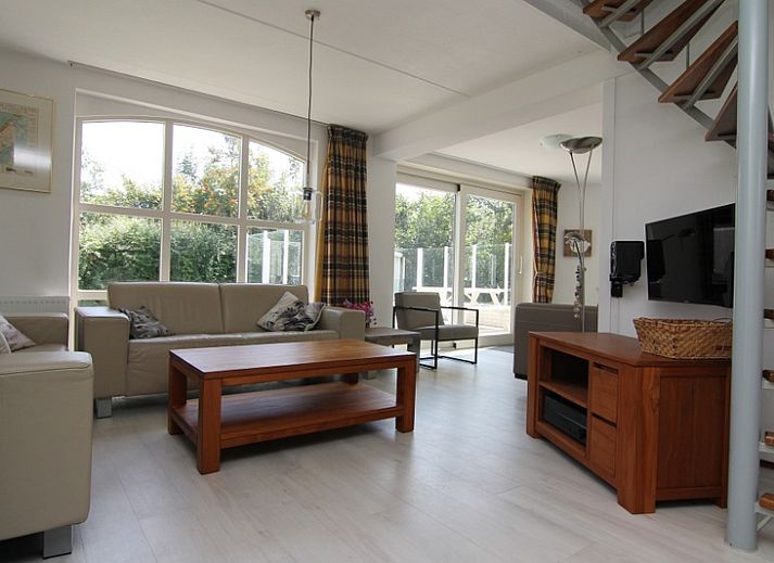 Vakantiehuis G 769 in De Cocksdorp, Texel, met zonnig terras en groene tuin, ideaal voor een ontspannen verblijf op de Waddeneilanden.