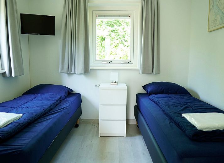 Vakantiehuis G 769 in De Cocksdorp, Texel, met ruime tuin en terras, ideale locatie voor een ontspannen verblijf op de Waddeneilanden.