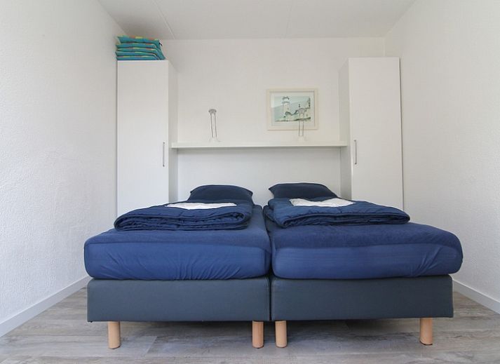 Vakantiehuis A 217 in De Cocksdorp, Texel, biedt een serene tuin en moderne architectuur op de Waddeneilanden.