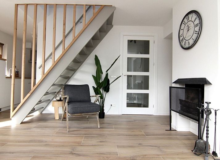 Vacation home A 075 in De Cocksdorp, Texel, Wadden Islands offers a modern exterior with spacious veranda for a relaxing stay.