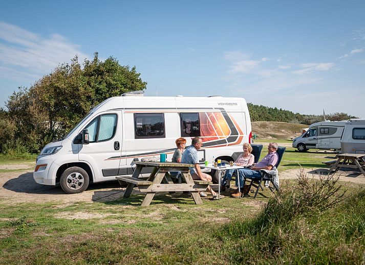 Enjoy nature at Sluftervallei Comfort camping site C1, located on Texel, overlooking dunes.
