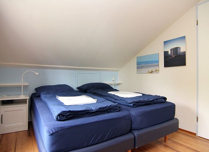 Ferienhaus D 657 in De Cocksdorp, Texel, umgeben von viel Gruen und Ruhe, ideal fuer einen erholsamen Aufenthalt auf den Watteninseln.