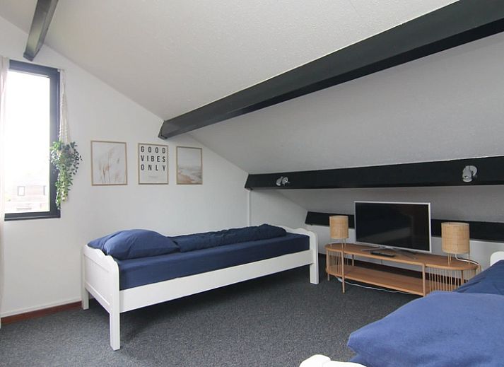 Vakantiehuis C 077 in De Cocksdorp, Texel biedt een zonnig terras voor ontspanning op de Waddeneilanden.