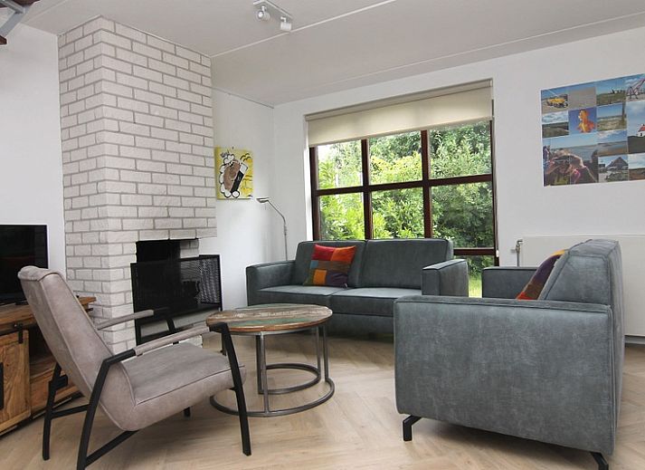 Vakantiehuis D 475 in De Cocksdorp, Texel biedt een charmante buitenruimte met terras en groene tuin, ideaal voor ontspanning op de Waddeneilanden.