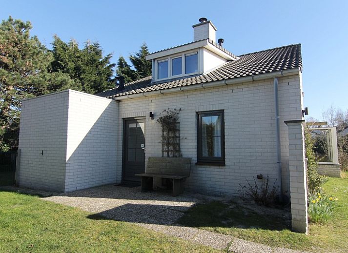 Luchtfoto van Vakantiehuis F 569 in De Cocksdorp, Texel. Dit vakantiehuis biedt een ruim terras en groene omgeving op de Waddeneilanden.