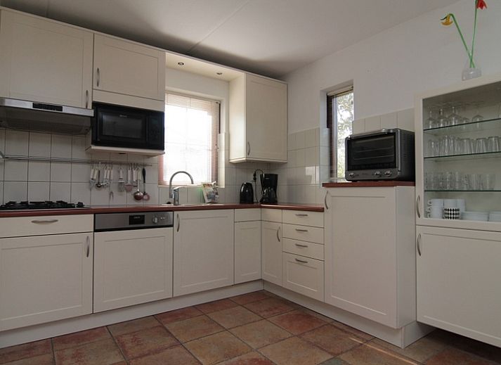 Vacation home E 645 in De Cocksdorp on Texel, a charming vacation home surrounded by nature on the Wadden Islands with inviting terrace.