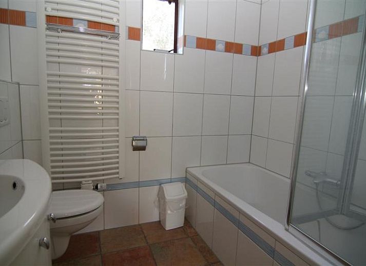 Vacation home E 645 in De Cocksdorp on Texel, a charming vacation home surrounded by nature on the Wadden Islands with inviting terrace.