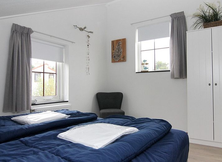 Vakantiehuis E 545 in De Cocksdorp, Texel, met zonnig terras en moderne buitenruimte op de Waddeneilanden.