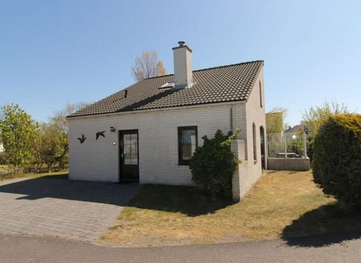 Vakantiehuis E 407 in De Cocksdorp, Texel, biedt een charmant verblijf met een zonnige tuin en rustige omgeving op de Waddeneilanden.