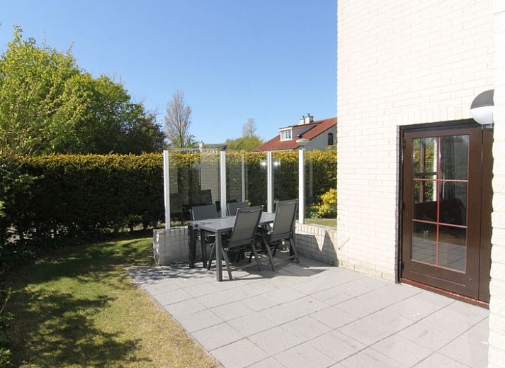 Vakantiehuis E 407 in De Cocksdorp, Texel, biedt een charmant verblijf met een zonnige tuin en rustige omgeving op de Waddeneilanden.