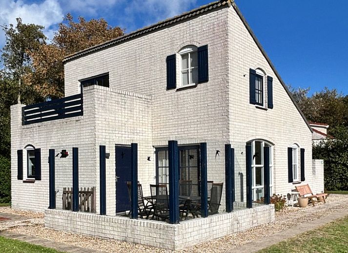 Vacation home F 791 in De Cocksdorp, Texel, offers a charming terrace and green surroundings for a relaxing stay on the Wadden Islands.