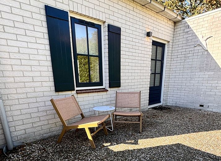 Vacation home F 791 in De Cocksdorp, Texel, offers a charming terrace and green surroundings for a relaxing stay on the Wadden Islands.