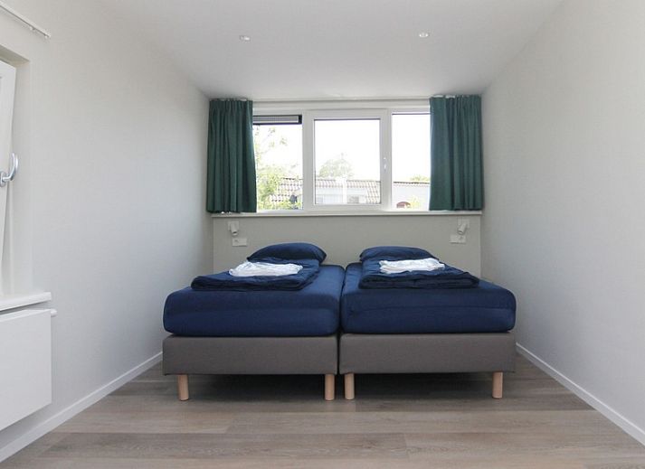 Das Ferienhaus F 775 in De Cocksdorp, Texel, bietet einen ruhigen Aussenbereich inmitten der Natur auf den Watteninseln.