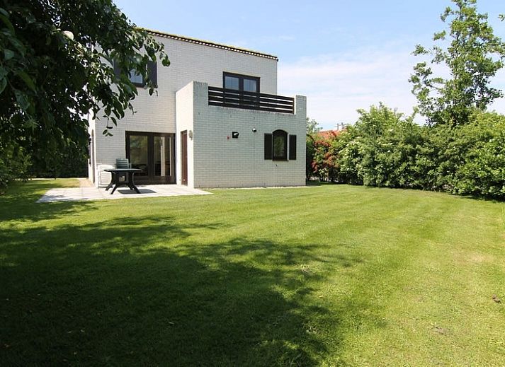 Vakantiehuis E 571 in De Cocksdorp, Texel, een charmant vakantiehuis omringd door groene natuur op de Waddeneilanden.