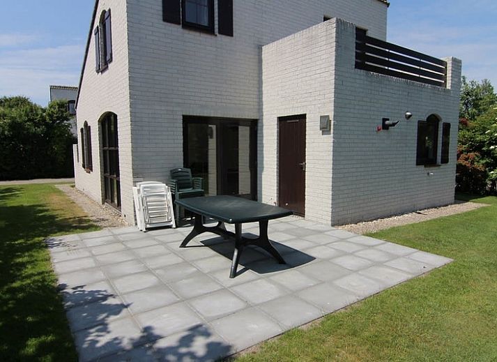 Vakantiehuis E 571 in De Cocksdorp, Texel, een charmant vakantiehuis omringd door groene natuur op de Waddeneilanden.