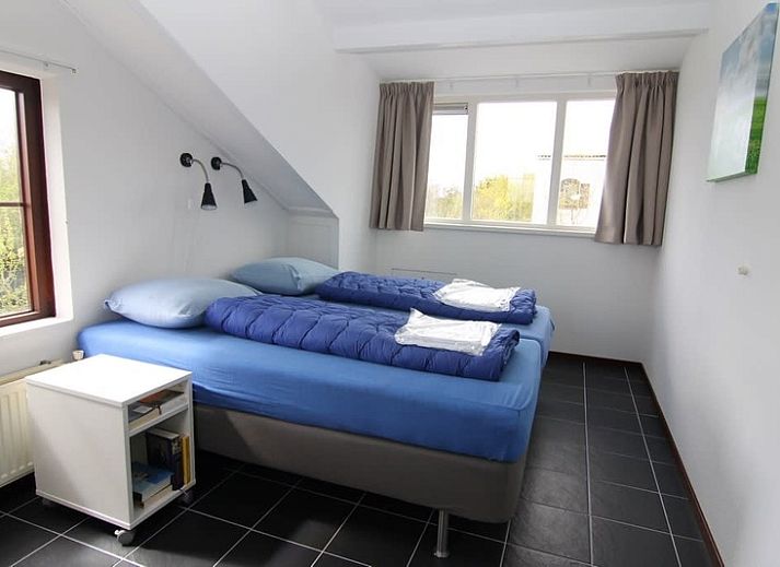 Vakantiehuis E 571 in De Cocksdorp, Texel, met ruime tuin en terras, ideaal voor ontspannen verblijf op de Waddeneilanden.