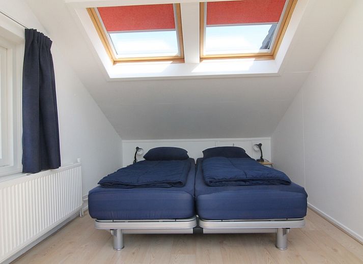 Vakantiehuis F 782 in De Cocksdorp, Texel, biedt een ruime tuin en moderne architectuur voor een ontspannen verblijf op de Waddeneilanden.