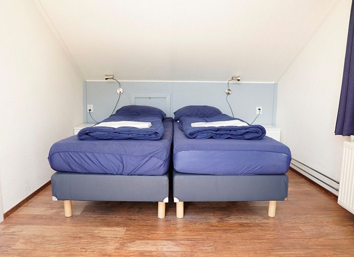 Vakantiehuis F 686 in De Cocksdorp, Texel biedt een serene tuin en terras, ideaal voor ontspanning op de Waddeneilanden.