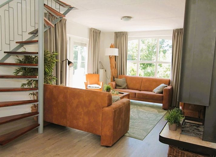 Vacation home F 681 in De Cocksdorp, Texel, surrounded by green nature and an inviting path to the front door.