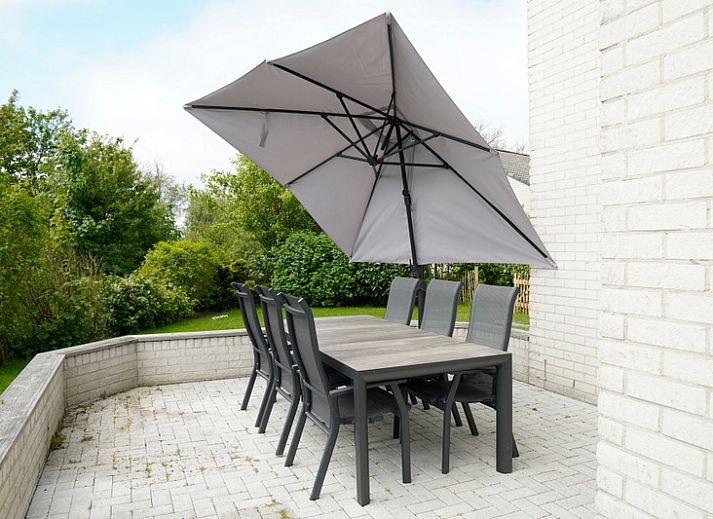 Vakantiehuis F 759 in De Cocksdorp, Texel, biedt een serene buitenruimte met een charmante gevel en omringende natuur op de Waddeneilanden.