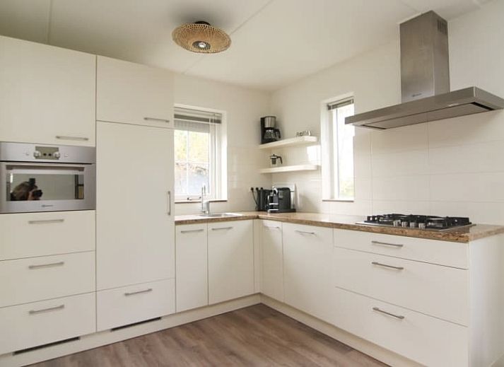 Vacation home F 776 in De Cocksdorp, Texel with sunny garden and green surroundings, ideal for a relaxing vacation on the Wadden Islands.