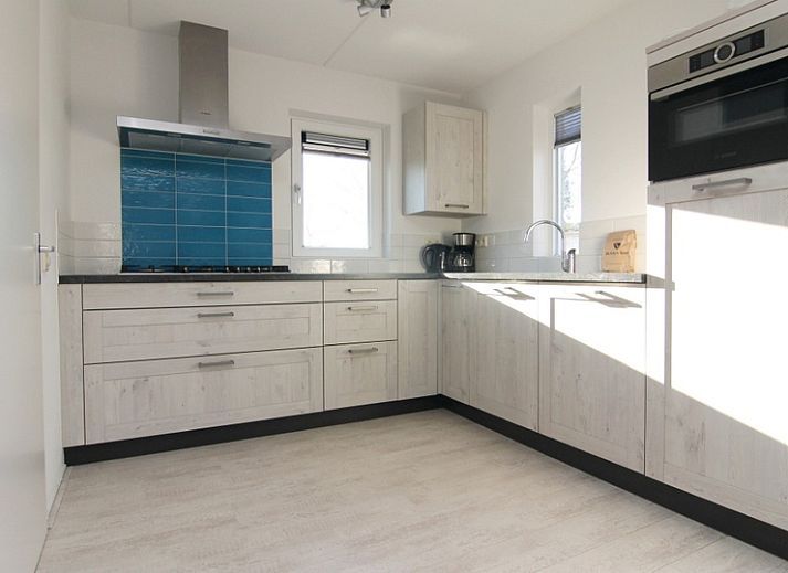 Vakantiehuis F 765 in De Cocksdorp, Texel, biedt een charmant verblijf met moderne architectuur en een rustige omgeving op de Waddeneilanden.