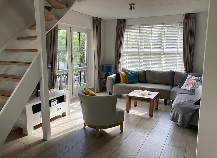 Vakantiehuis E 501 in De Cocksdorp, Texel, Waddeneilanden biedt een charmante buitenkant met ruime tuin en rustige omgeving.