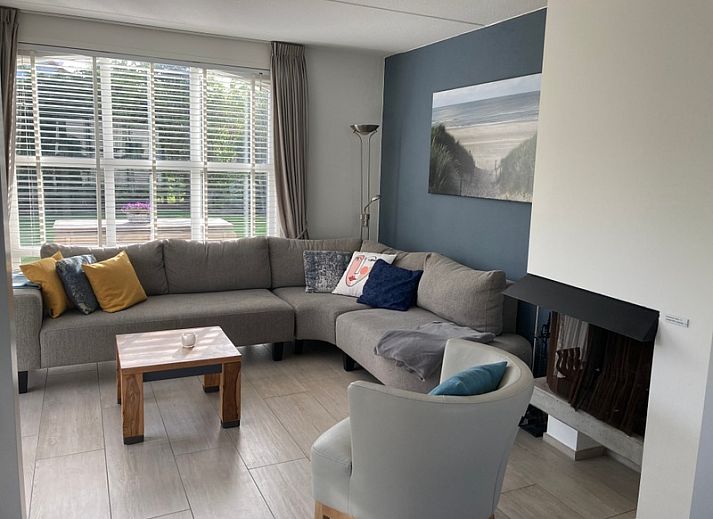 Vakantiehuis E 501 in De Cocksdorp, Texel, Waddeneilanden biedt een charmante buitenkant met ruime tuin en rustige omgeving.