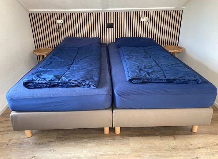 Vakantiehuis E 501 in De Cocksdorp, Texel biedt een ruime tuin en terras voor ontspanning te midden van de prachtige natuur van de Waddeneilanden.