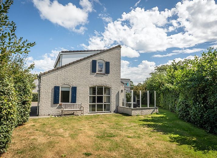 Das Ferienhaus E 511 in De Cocksdorp, Texel, bietet einen charmanten Aufenthalt auf den Watteninseln mit einem sonnigen Garten und einer ruhigen Umgebung.