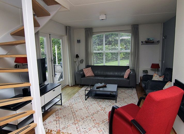 Das Ferienhaus E 511 in De Cocksdorp, Texel, bietet einen charmanten Aufenthalt auf den Watteninseln mit einem sonnigen Garten und einer ruhigen Umgebung.