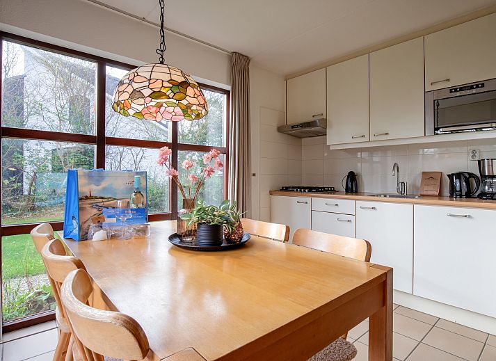 Gezellige woonkamer in Annemein vakantiehuis, De Cocksdorp, Texel met comfortabele zithoek en moderne inrichting.