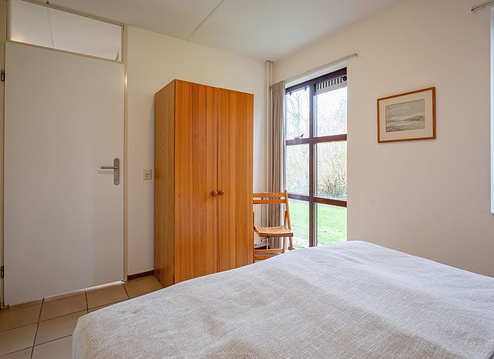 Gezellige woonkamer in Annemein vakantiehuis, De Cocksdorp, Texel met comfortabele zithoek en moderne inrichting.