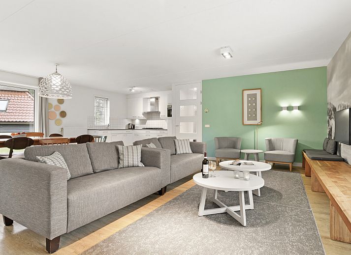 Spacious terrace at Sluftervallei 10-person bungalow, De Cocksdorp, Texel. Enjoy nature on the Wadden Islands.