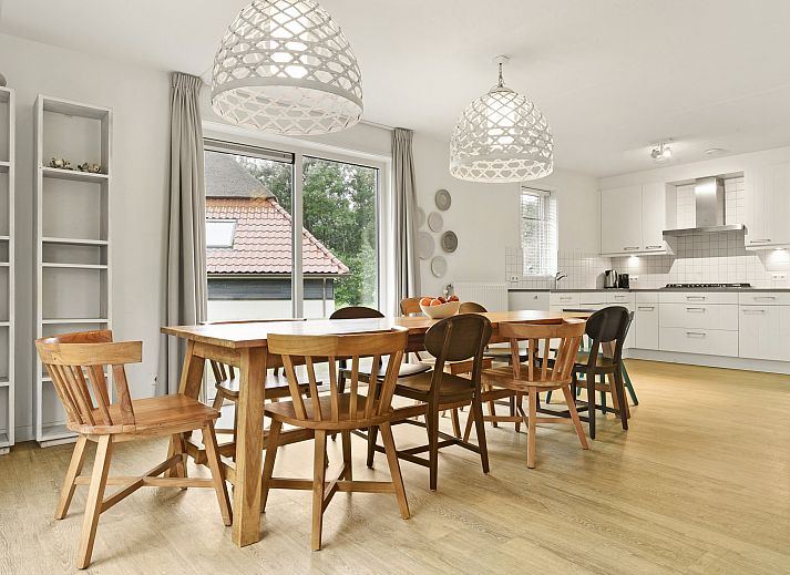 Modern living room in Sluftervallei bungalow, De Cocksdorp, Texel. Comfortable space for relaxation.