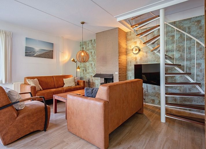 Villapark Residence Texel No. 719 in De Cocksdorp, a vacation home surrounded by nature on the Wadden Islands, with spacious garden and veranda.