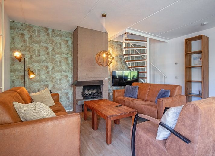 Villapark Residence Texel No. 719 in De Cocksdorp, a vacation home surrounded by nature on the Wadden Islands, with spacious garden and veranda.