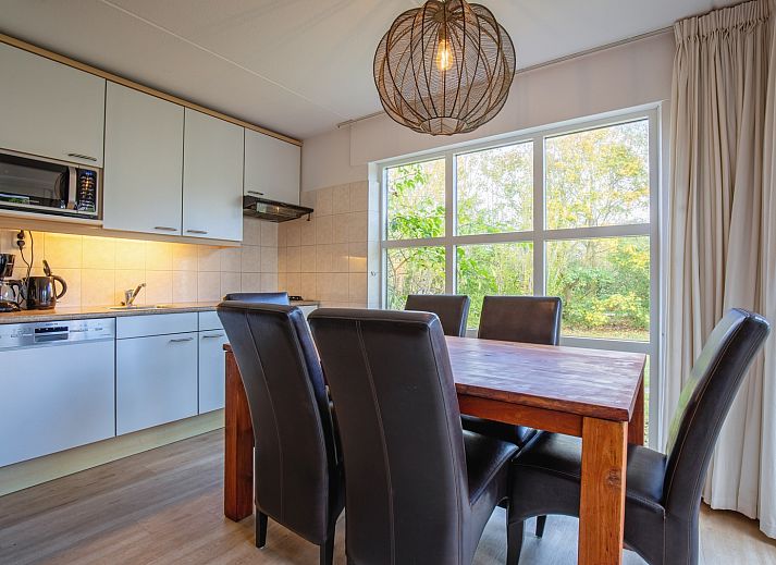 Villapark Residence Texel No. 719 in De Cocksdorp, a vacation home surrounded by nature on the Wadden Islands, with spacious garden and veranda.