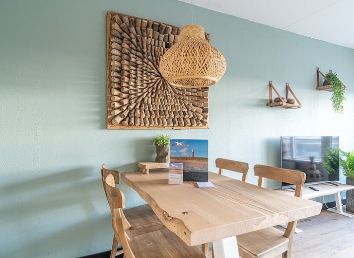 Gezellige zithoek in Appartement Juliana 140 Eiland en Zeezicht, De Koog, Texel met uitzicht op zee.