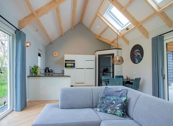 De Houtsnip vakantiehuis in De Koog, Texel met groene tuin en moderne architectuur.