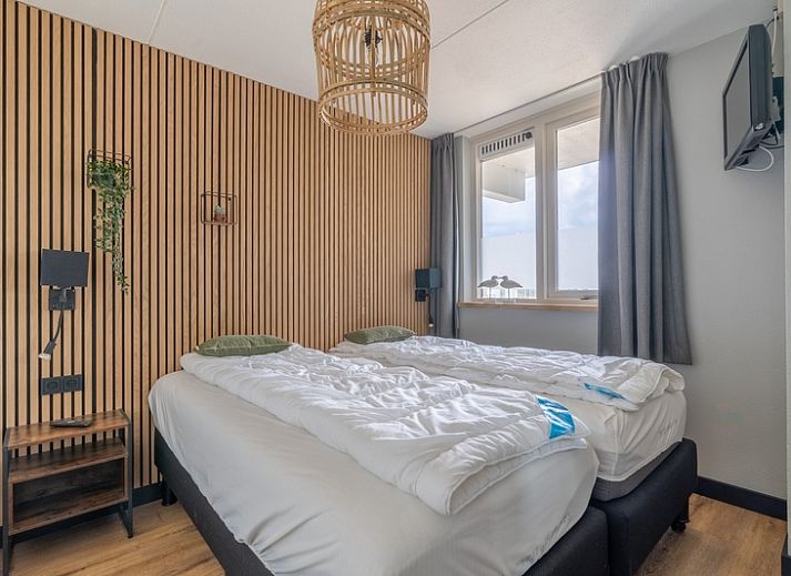 Ruime zithoek met uitzicht op de natuur bij Appartement Juliana 086 Eiland en Zeezicht, Waddeneilanden.