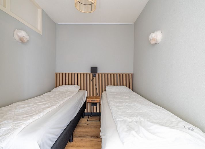 Ruime zithoek met uitzicht op de natuur bij Appartement Juliana 086 Eiland en Zeezicht, Waddeneilanden.