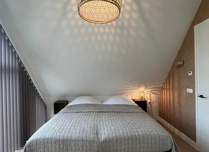 Vakantiehuis Noordwester in De Koog, Texel met moderne architectuur en groene omgeving.