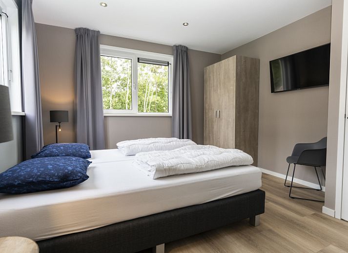 Villa 17 in De Koog, Texel, vakantiehuis met zonnig terras en groene omgeving op de Waddeneilanden.