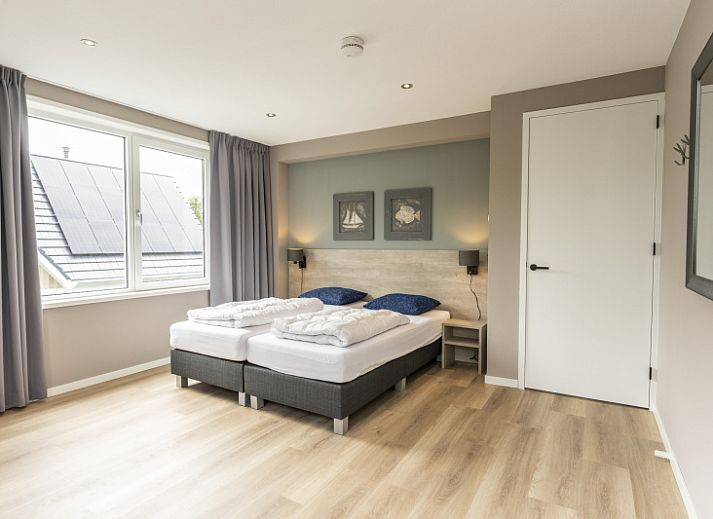 Villa 17 in De Koog, Texel, vakantiehuis met zonnig terras en groene omgeving op de Waddeneilanden.