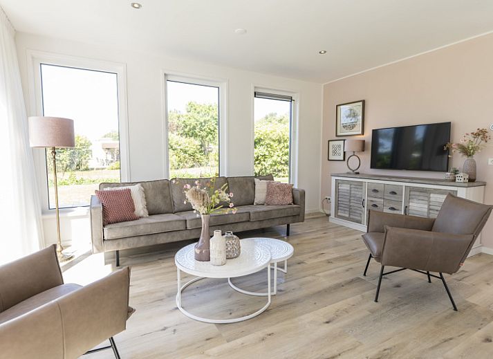 Villa 35a in De Koog Texel met ruime tuin en trampoline, perfect vakantiehuis op de Waddeneilanden.