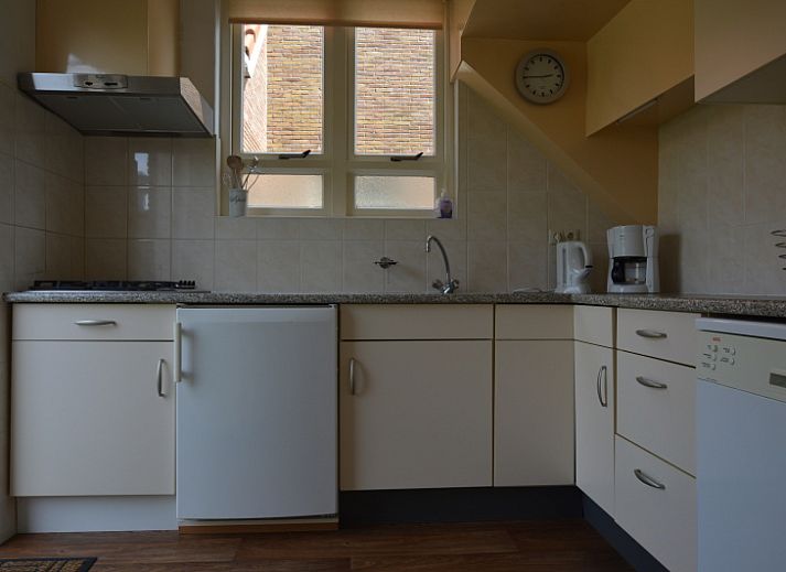 Vakantiehuis Watersnip in De Koog, Texel met charmante gevel en groene tuin.