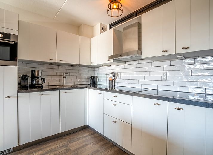 Lichte zithoek in Appartement Juliana 048 met zeezicht in De Koog, Texel, Waddeneilanden.